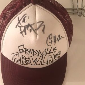 A hat signed by Frank Iero and Roger Harvey